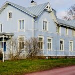 Beautiful blue house in Mariehamn, Åland Islands showcasing Nordic architecture.
